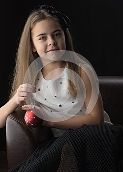 Little girl on a black background