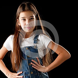 Little girl on a black background