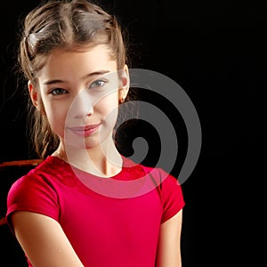 Little girl on a black background