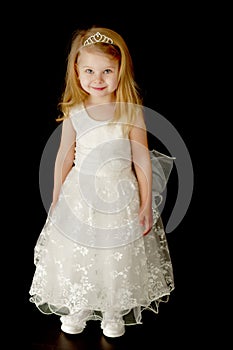 Little girl on a black background