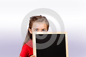 Little girl with blackboard