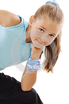 Little girl in blue sportswear