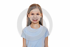 Little girl in a blue T-shirt on a white background.