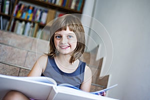 Little girl with book