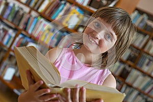 Little girl with book