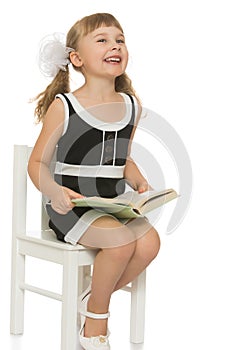 Little girl with a book