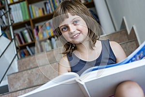 Little girl with book