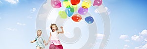 Little Girl and Boy Outdoors Holding Balloons Concept photo