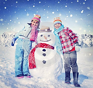 Little Girl and Boy Outdoors with Snowman