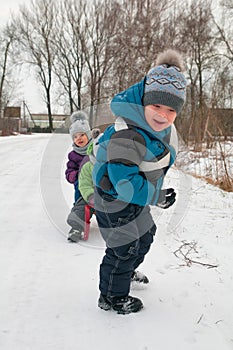 Little girl and boys