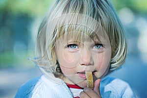 Little girl with bread