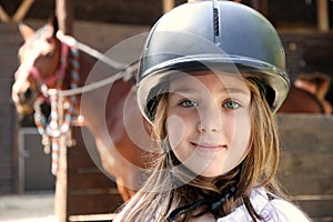 Little girl and brown Horse