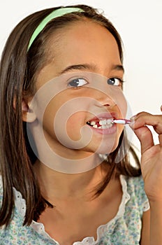 Little Girl Brushing her Teeth