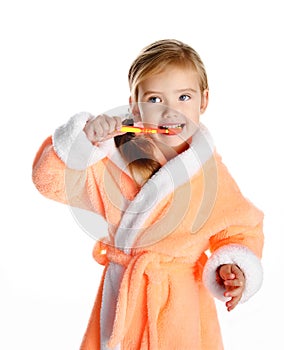 Little girl brushing her teeth isolated