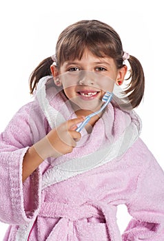 Little girl brushing teeth