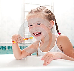 Little girl brushing teeth