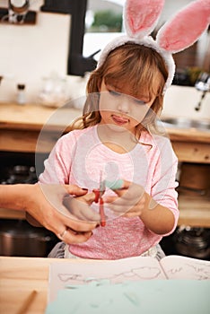 Little girl, bunny ears and cutting with scissors for arts and crafts, class project or decor. Closeup of child or kid