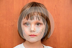 Little girl with butterfly face paint