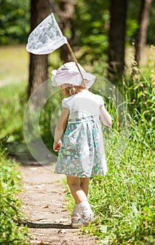 Little girl with butterfly net