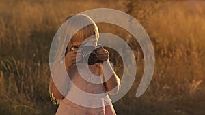 Little girl with camera