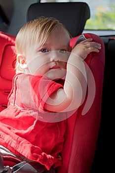 Little girl in car safety seat