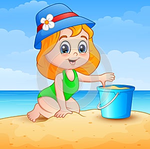 Little girl cartoon playing a sand on beach
