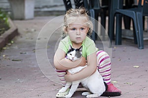 Little girl with cat