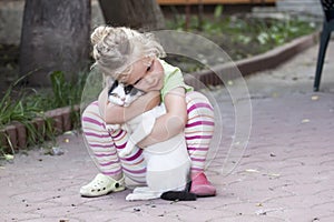 Little girl with cat