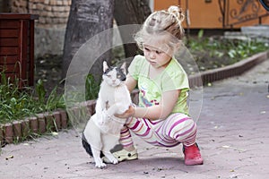 Little girl with cat