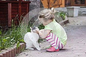 Little girl with cat