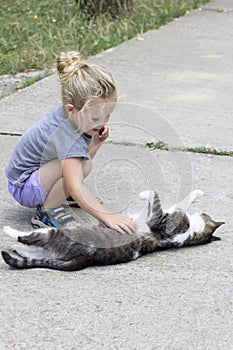 Little girl with cat