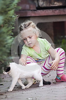 Little girl with cat