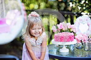 Little girl celebrate Happy Birthday Party with rose outdoor