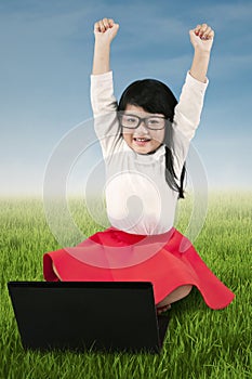 Little girl celebrate her achievement at field