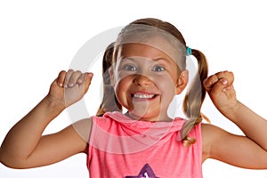 Little girl cheering with delight