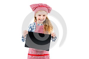 Little girl in chef uniform with blank paper