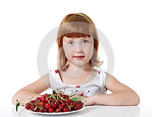 Little girl with cherry