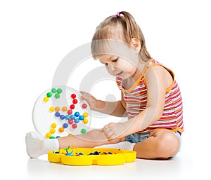 Little girl child playing toy