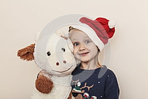 Little girl in a Christmas hat