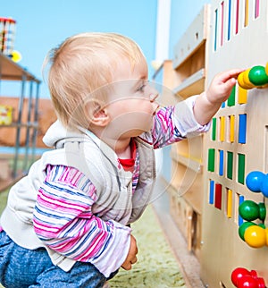 Little girl in the classroom early development