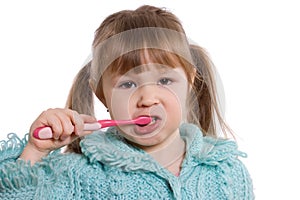 The little girl cleans a teeth photo