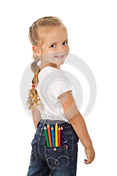 Little girl with colored pencils in back pocket