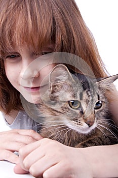 Little girl communicating with her pet photo