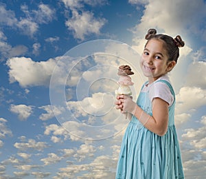 Little girl a cone with three ice cream flavors