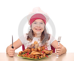 Little girl cook ready for lunch