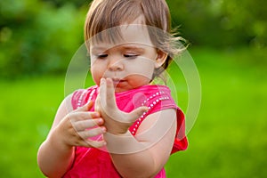 Little girl counting her fingers