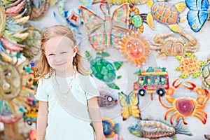 Little girl at crafts market