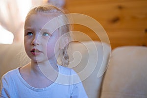 Little girl cries from grief and resentment.