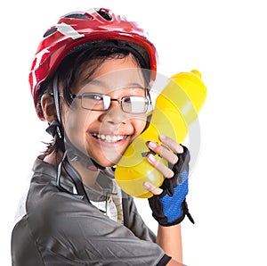 Little Girl With Cycling Attire Drinking IV