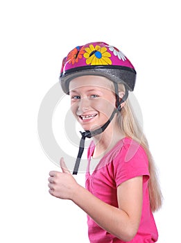 Little girl with cycling helmet on white